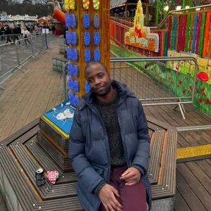 People we support and staff enjoying rides and festive activities at Winter Wonderland, Park House