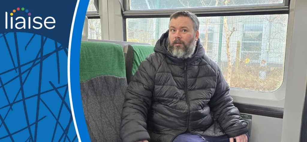Nicholas marking train travel independence outcomes with Liaise on his journey