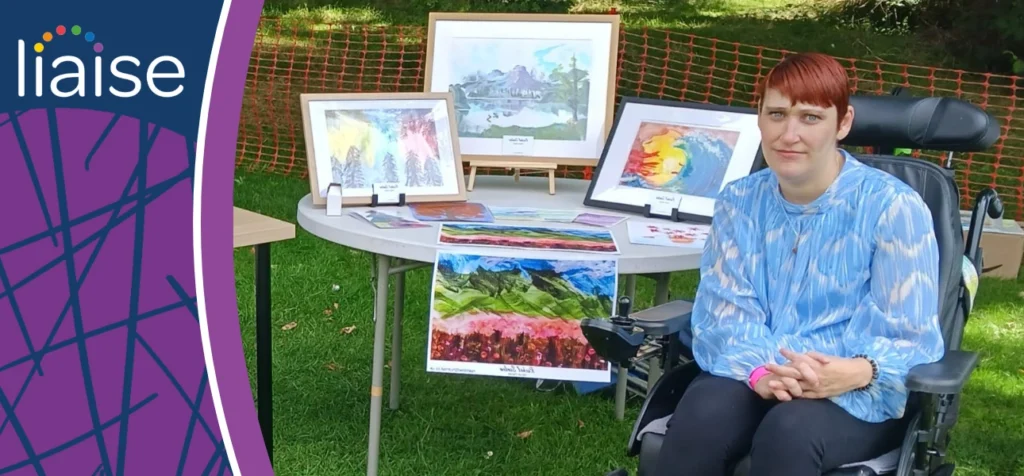 Rachel exhibiting her artwork at the Big Purple Funfest on a creative day out with Liaise