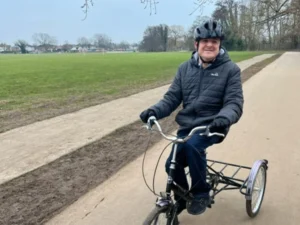 Michael Cycling Through Local Park