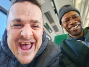 Michael Smiling With His Support Worker